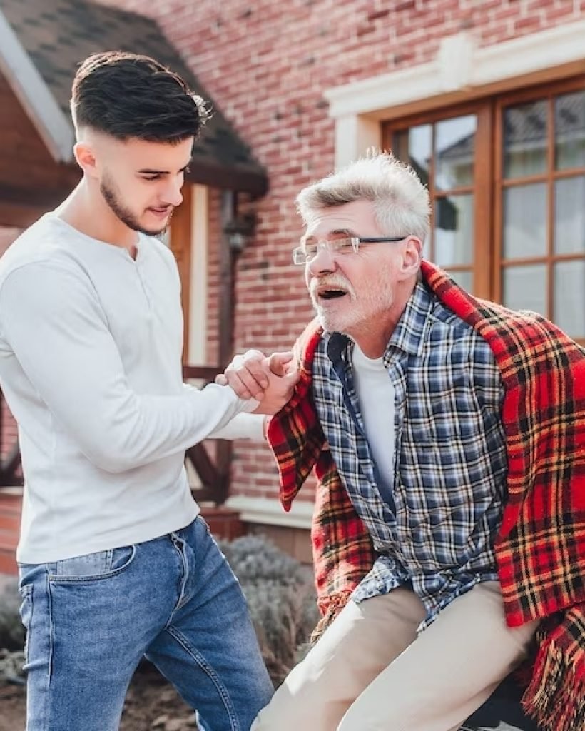 old-man-wheelchair-his-son-are-walking-garden-man-helping-his-elderly-father-gets-up-wheelchair_4961